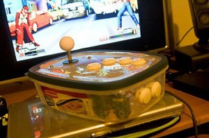 tupperware ps2 arcade stick 300x199 Tupperware PS2 Arcade Stick