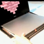 Two Dell Adamo Laptops Fit inside a Dell Laptop
